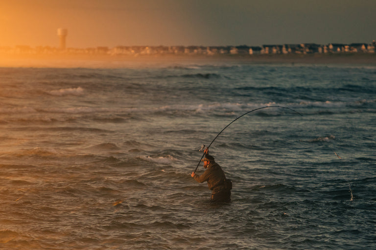 Wading In Water Surf Fishing LS Image | Penn®