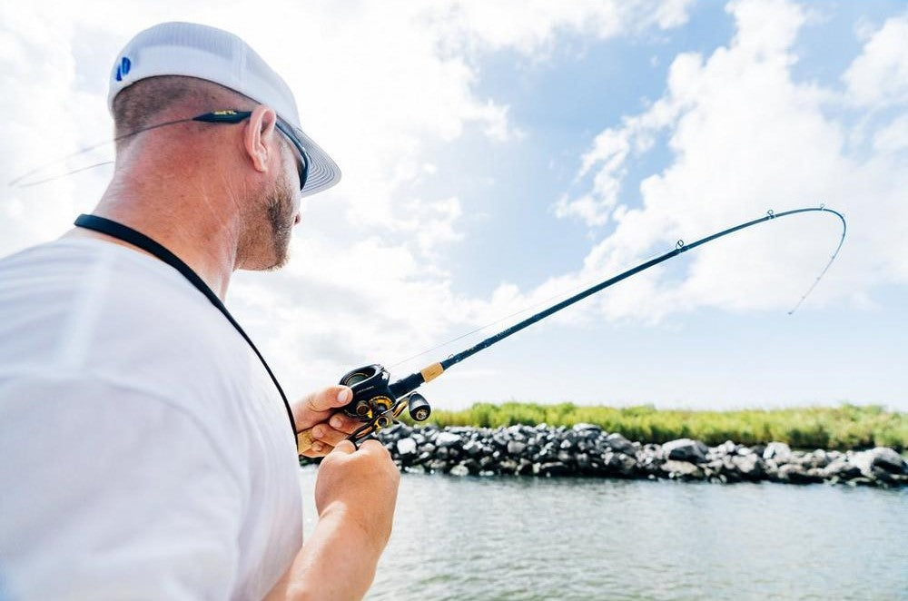 Man fishing with Fathom Low Profile