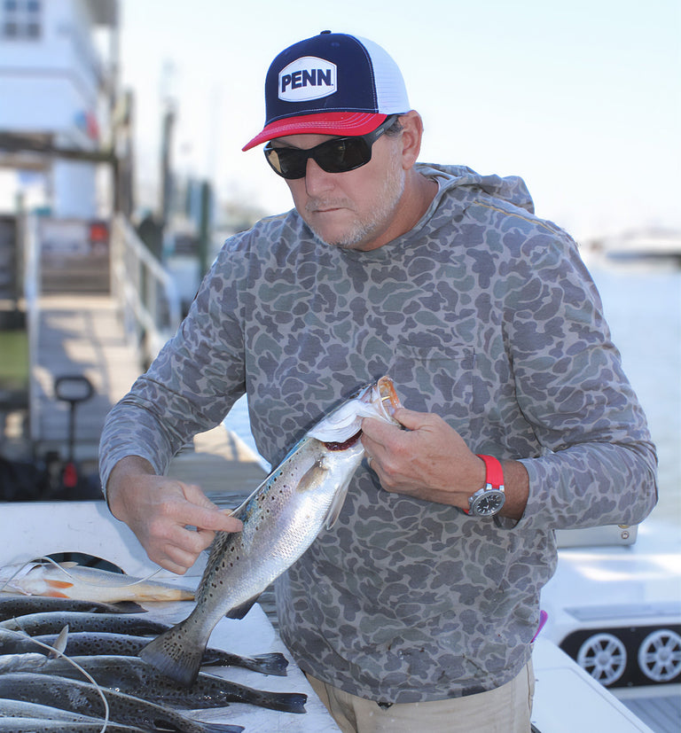 Captain Jamie Hough Cleaning Fish