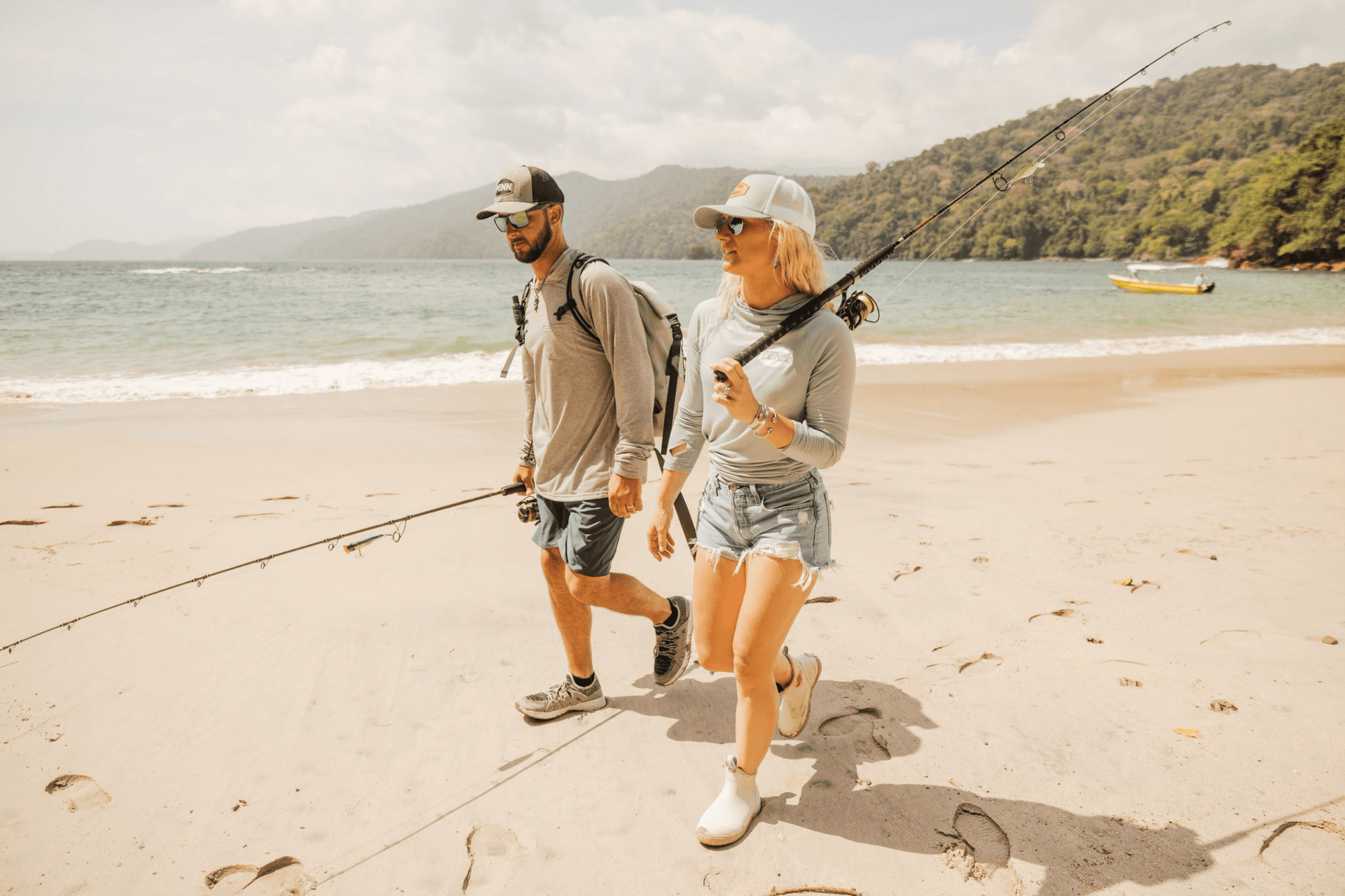 2 people walking and holding Authority 