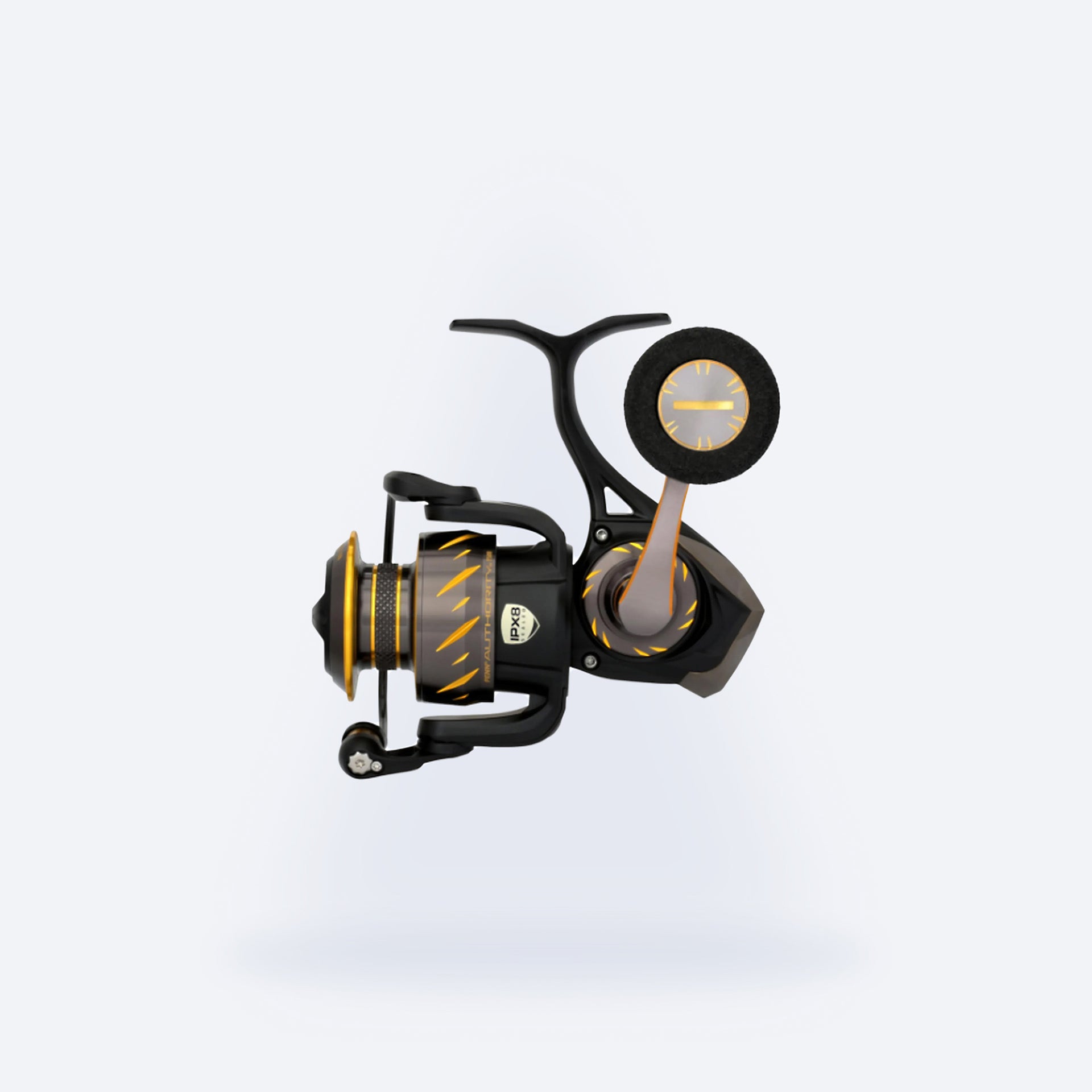 Fishing reel with black and yellow design on a light gray background